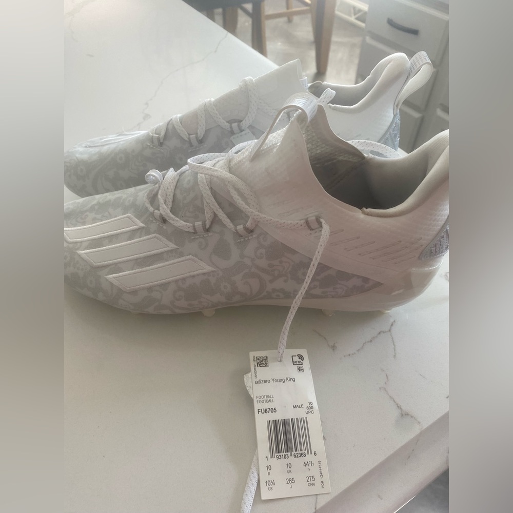 NEVER WORN. STILL WITH TAGS. adidas football cleats
